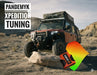 Off-road vehicle in a desert landscape with 'Pandemyk Xpedition Tuning' text and a reflective safety vest.